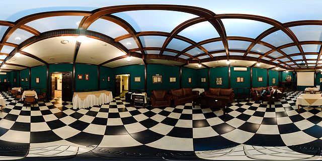 Sobranie restaurant interrior. Fireplace hall.